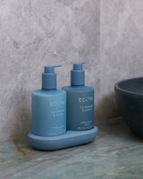 Ecoya Sandalwood and Amber hand and body wash and lotion styled on a bathroom vanity