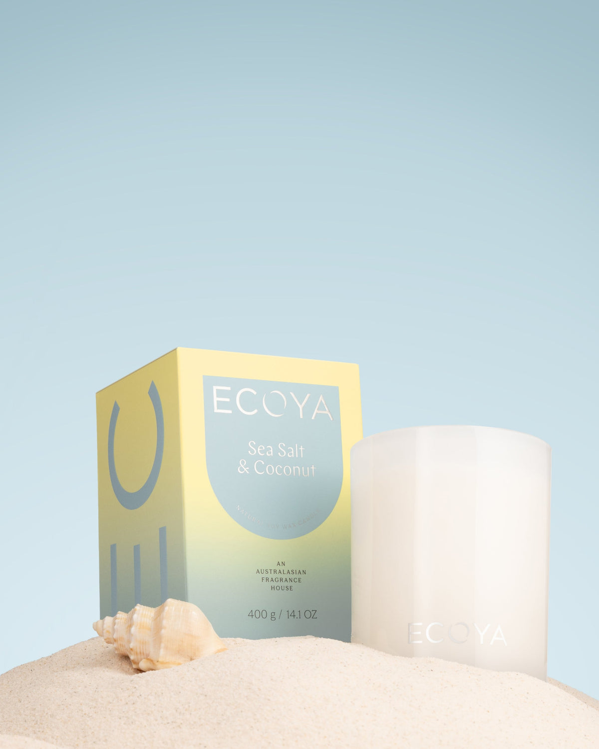Ecoya Sea Salt and Coconut Madison candle styled in a sunlit coastal interior