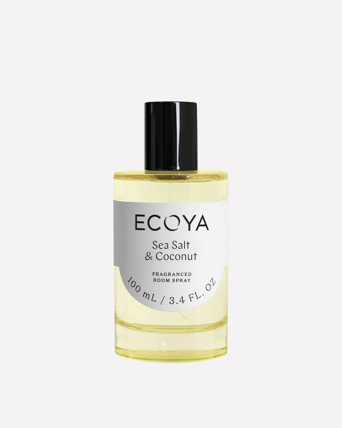 Ecoya Sea Salt & Coconut room spray in pale yellow glass with a black cap