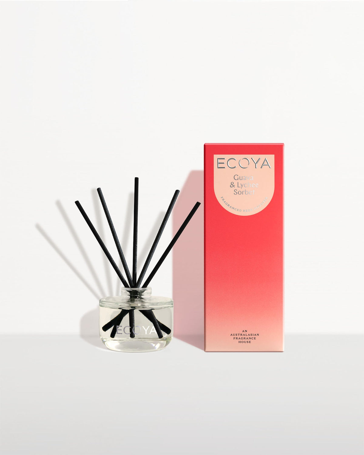 Ecoya Guava and Lychee Sorbet mini reed diffuser 50ml in a glass bottle with rattan reeds