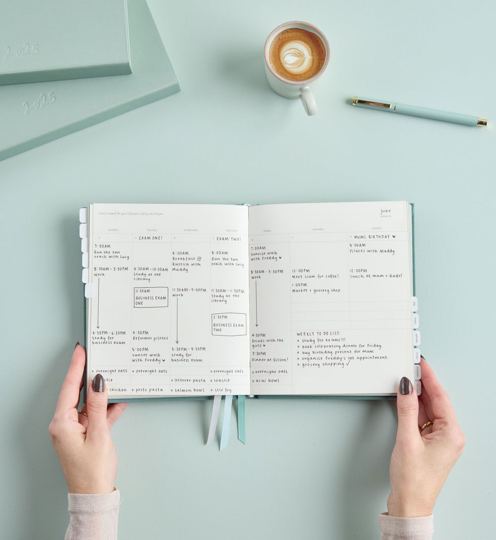 Planner Tab Stickers flat lay styling with pen and notebook by Emma Kate Co
