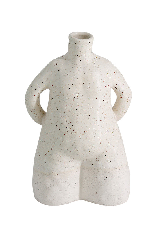 A Flux Home Enyo Bud Vase with speckles in an off-white color.
