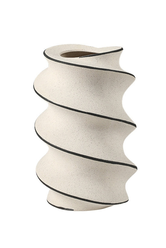 Spiral hand-painted ceramic vase in off-white with a charcoal line, plain background