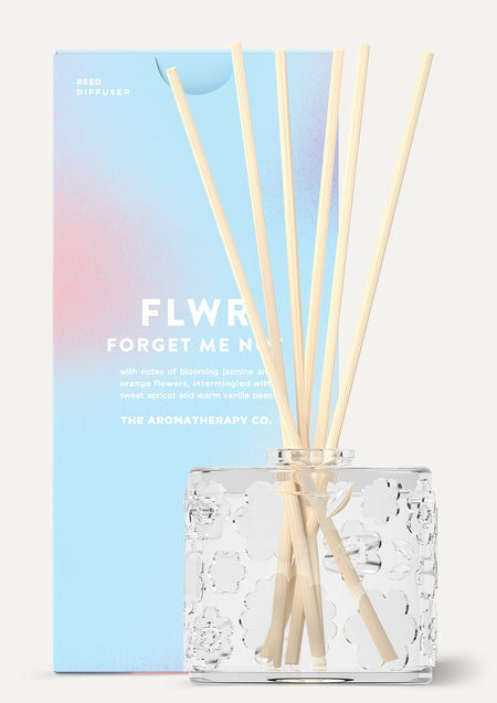 The Forget Me Not diffuser beside its blue gradient FLWR carton, shown on white