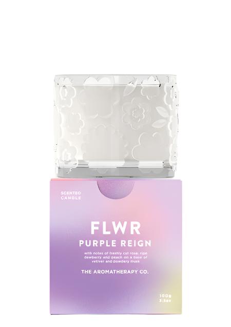 The FLWR Purple Reign candle standing on its purple gradient gift box, shown on white