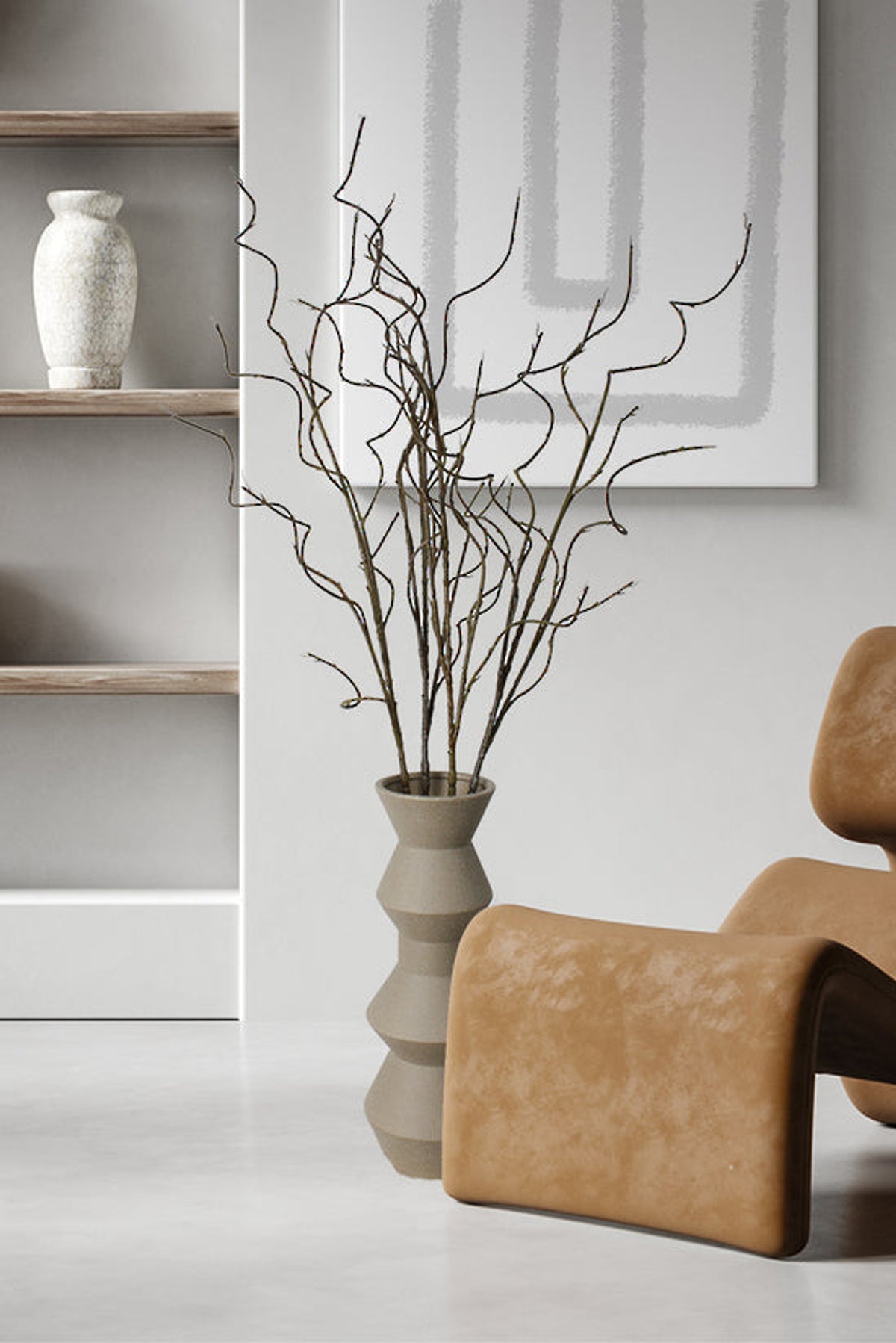 Curly willow branches styled in a tall floor vase
