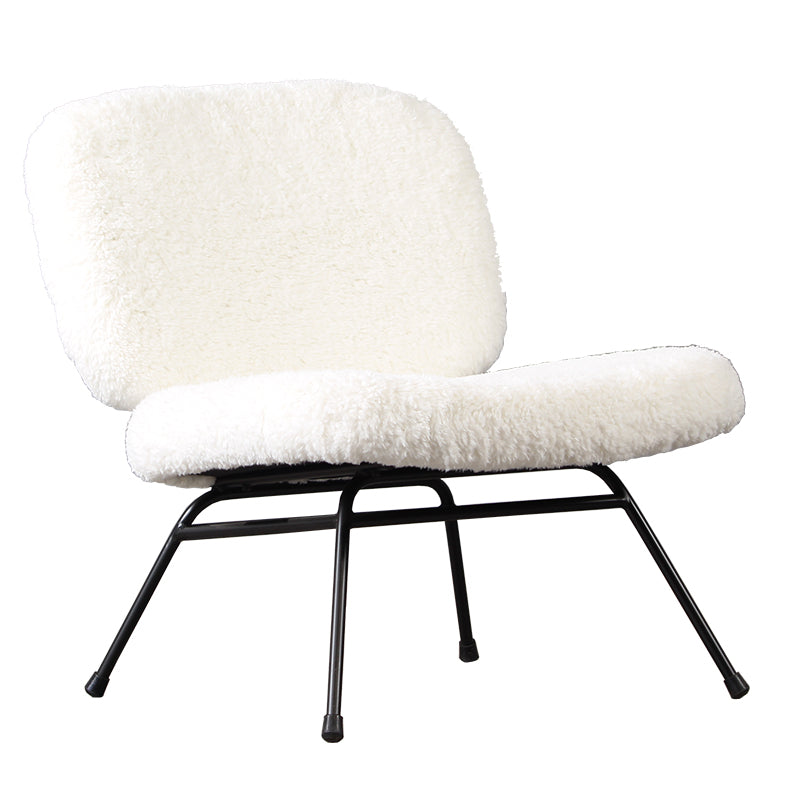 Crescent lounge chair with a shaggy white boucle seat and back on a slim black iron frame