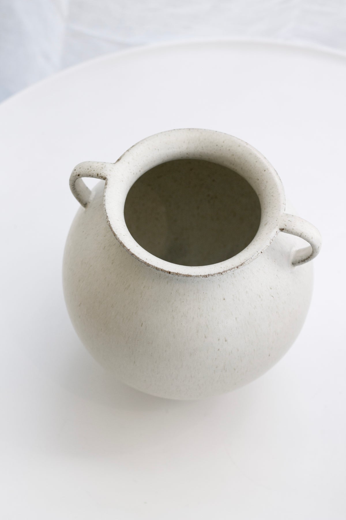 Fort Large Vase styled on a coffee table with a tray