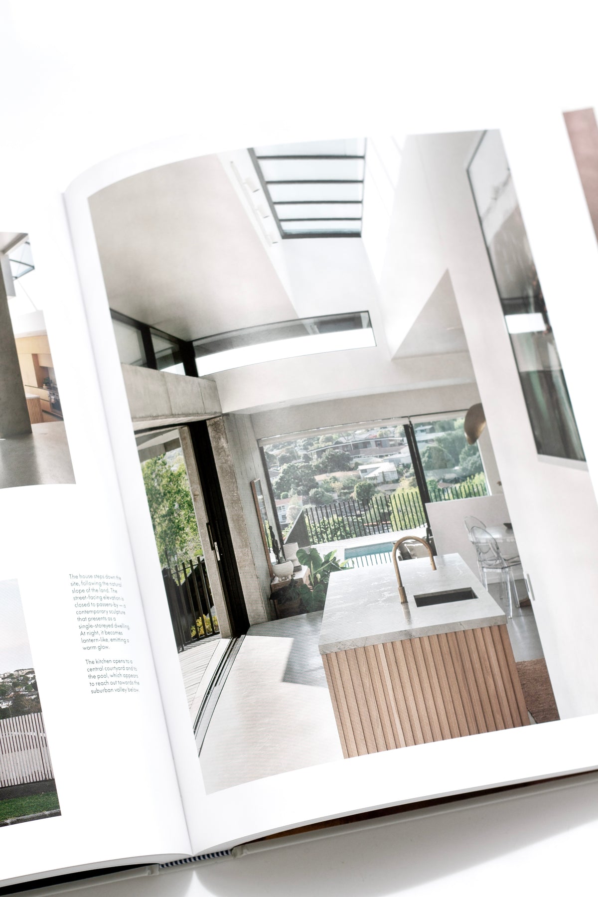 Homes of This Decade page spread showing an urban residence