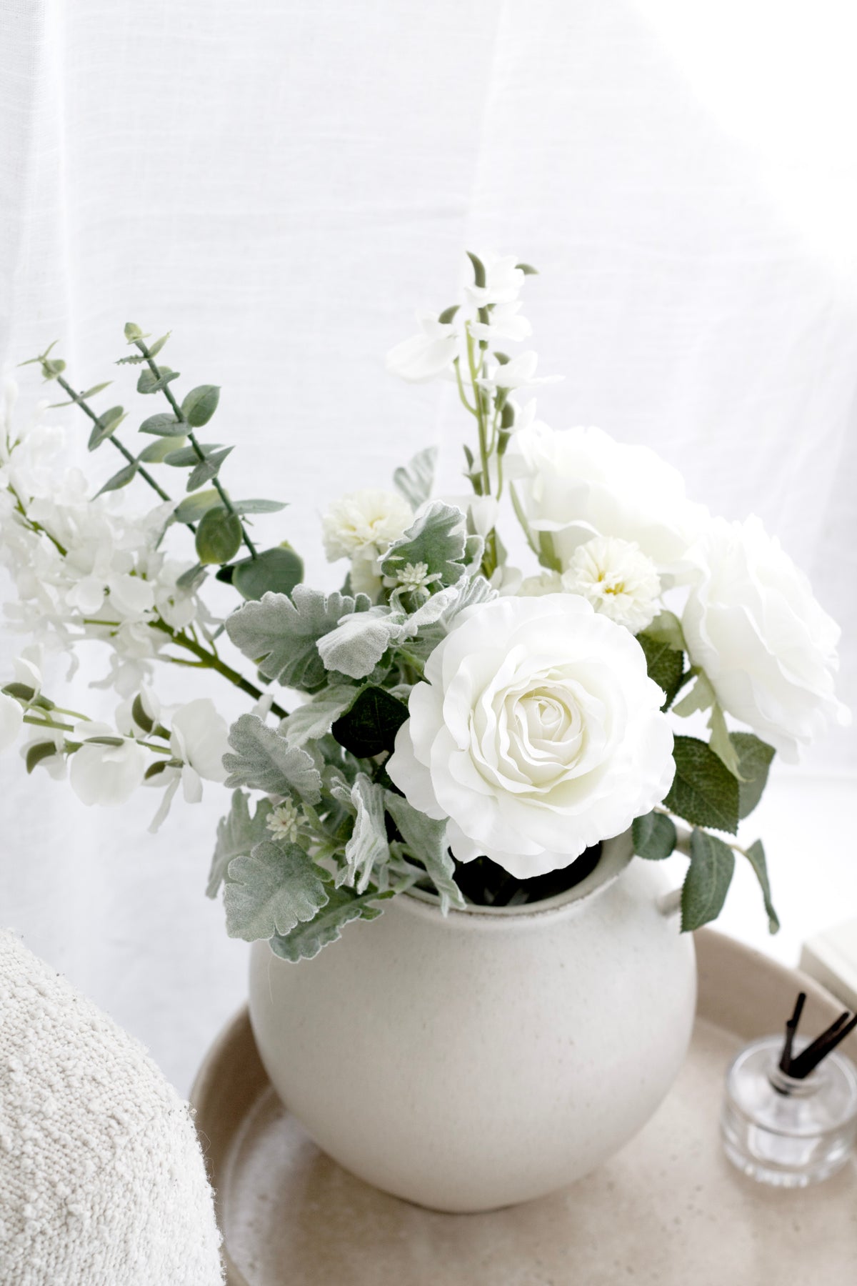 Sahara tray with white roses in a round vase