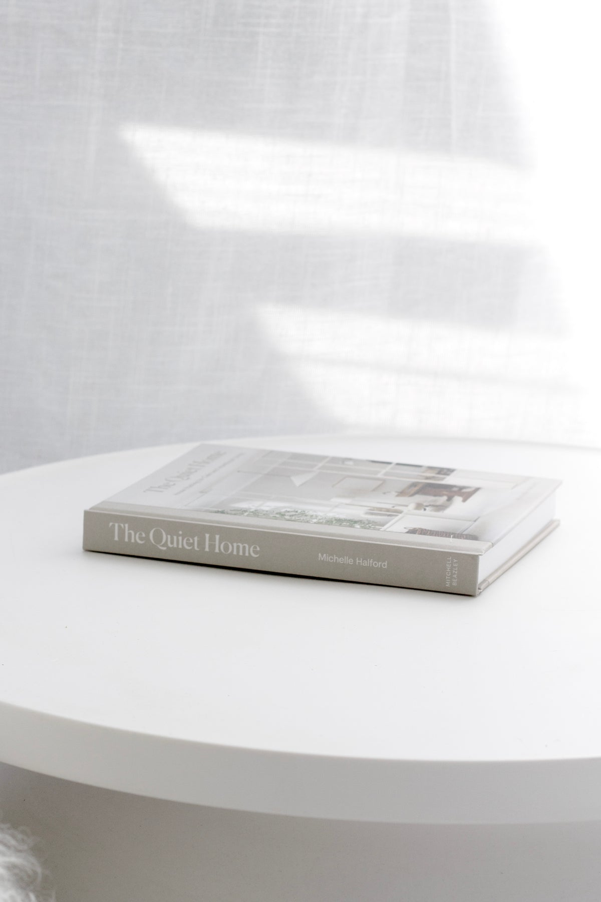 The Quiet Home styled on a shelf
