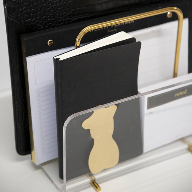 An Acrylic Gold Document Holder with a gold pen by Papier HQ.