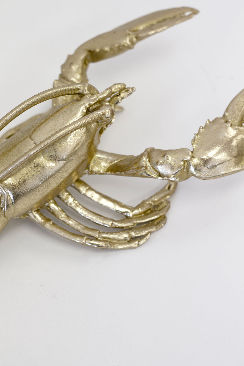 A Gold Lobster Ornament with no specified keywords.