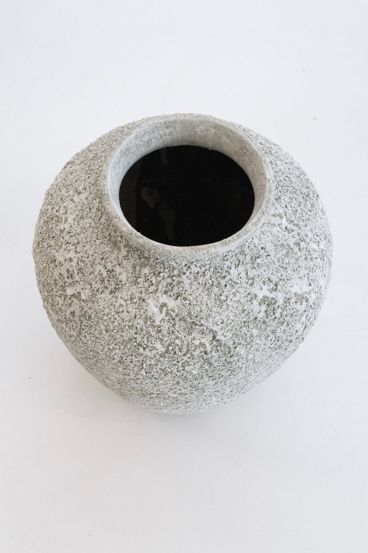 Top-down view into the Nerina vase showing its rounded shoulder and textured surface