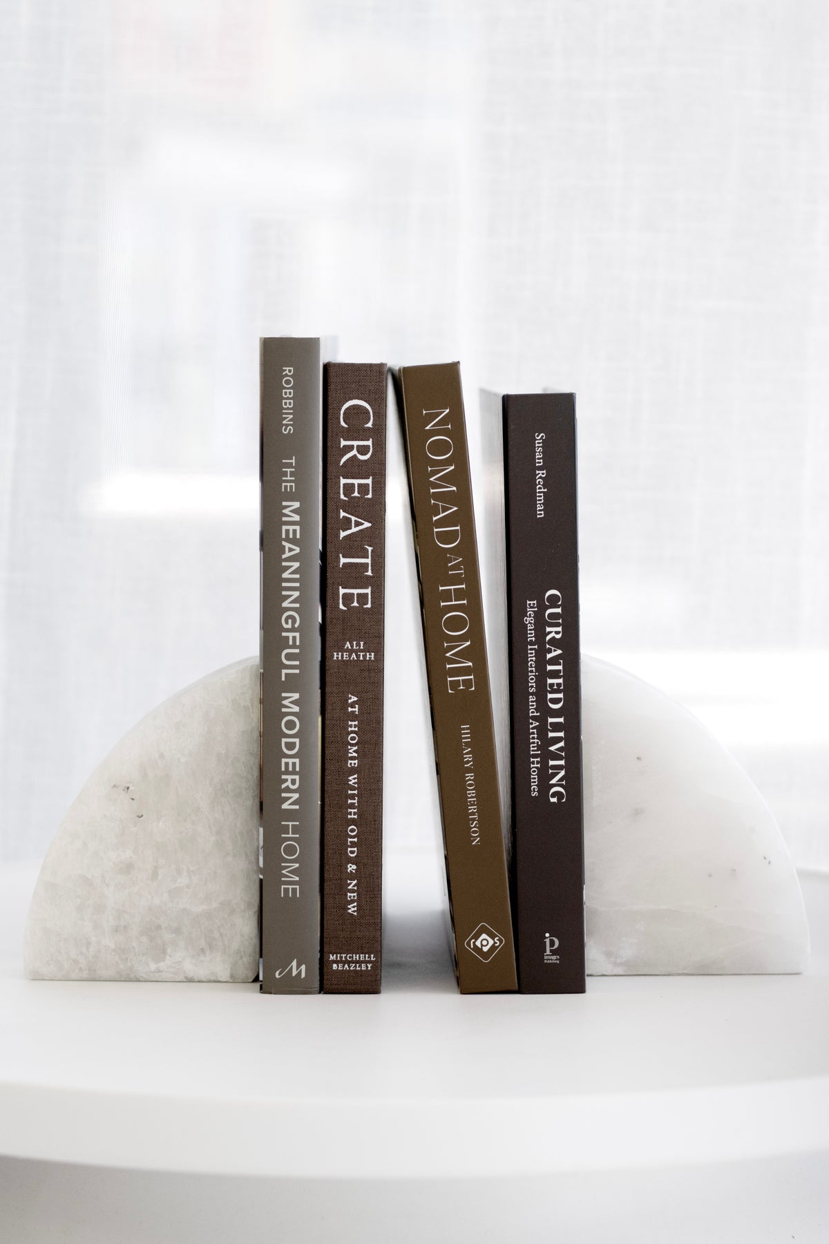 The Meaningful Modern Home styled on a coffee table