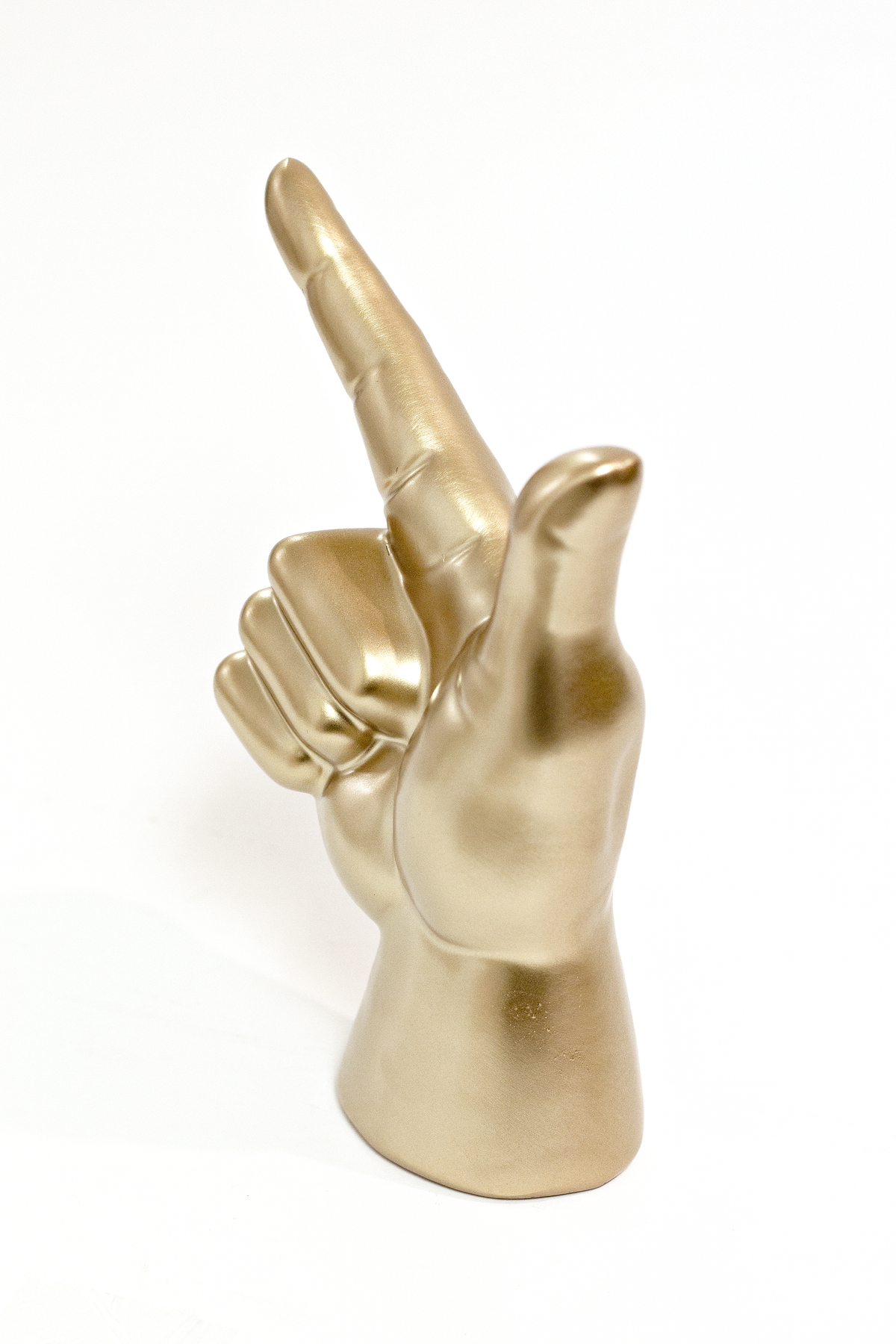 Gold Lucky Hand seen at three quarters, showing the curled fingers and rounded wrist base
