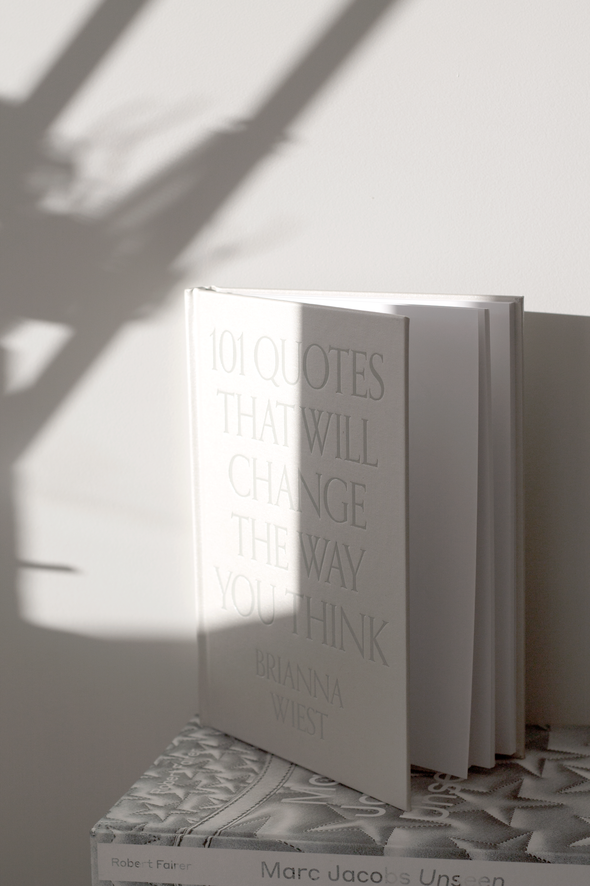 Close-up of the cover design of 101 Quotes That Will Change The Way You Think