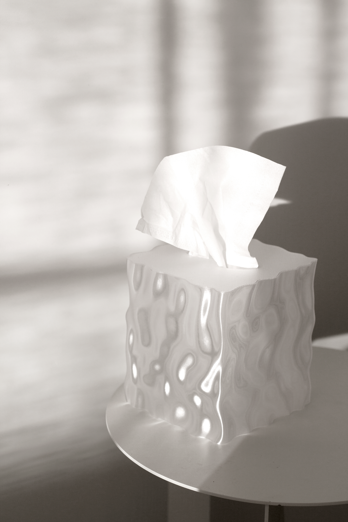 Clear Flow cover in bright sunlight on a side table