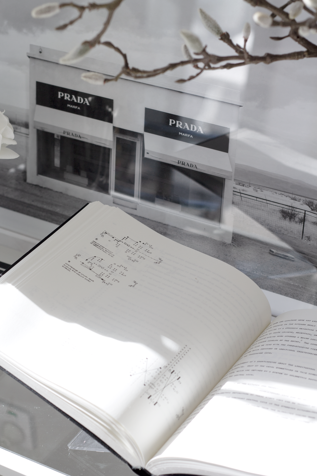 Clear acrylic book holder in a styled interior