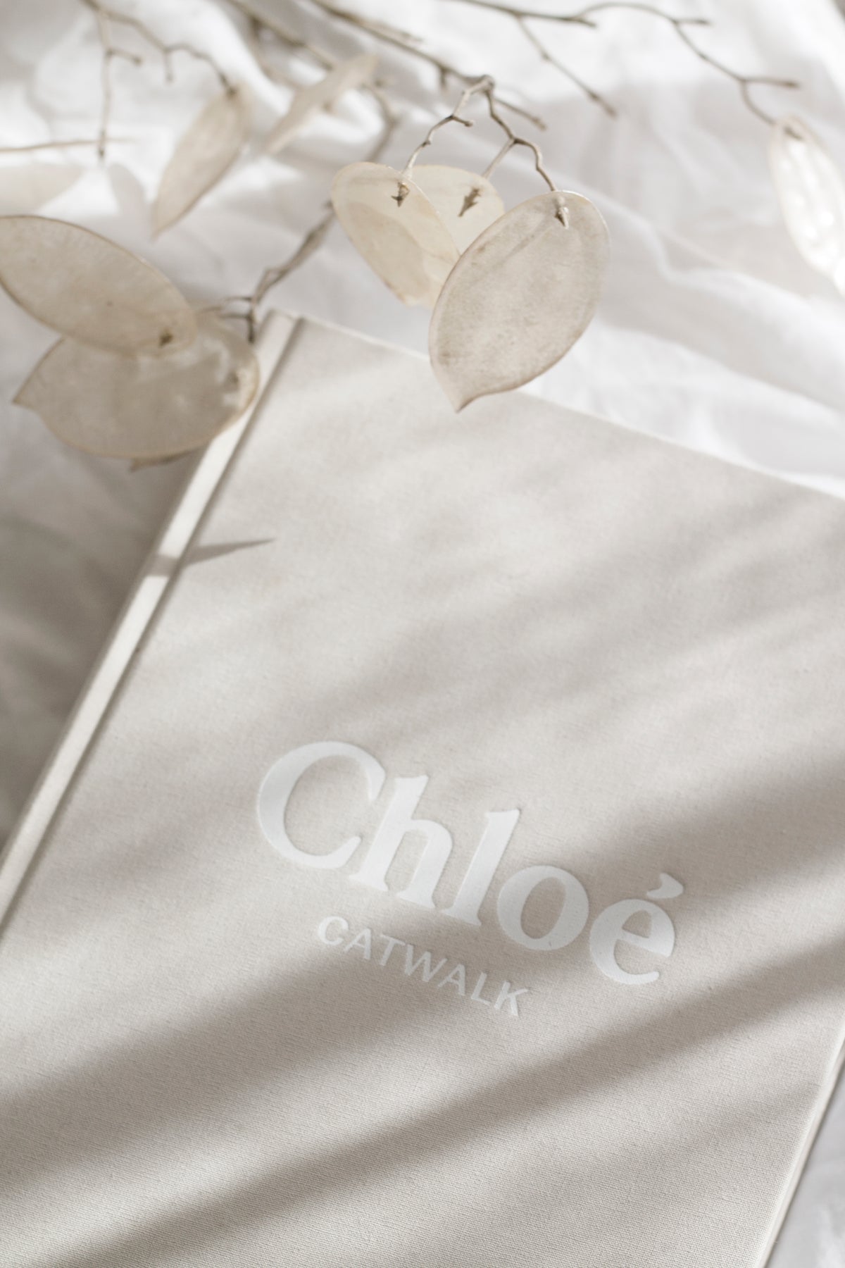 Chloé Catwalk book styled on a coffee table