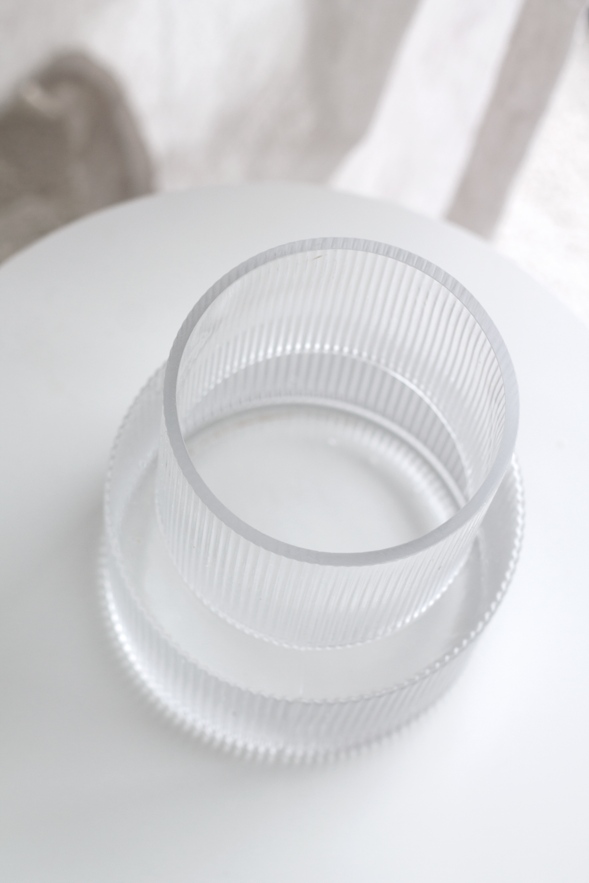 Overhead angle on the clear vase, showing the wide opening and ribbed interior
