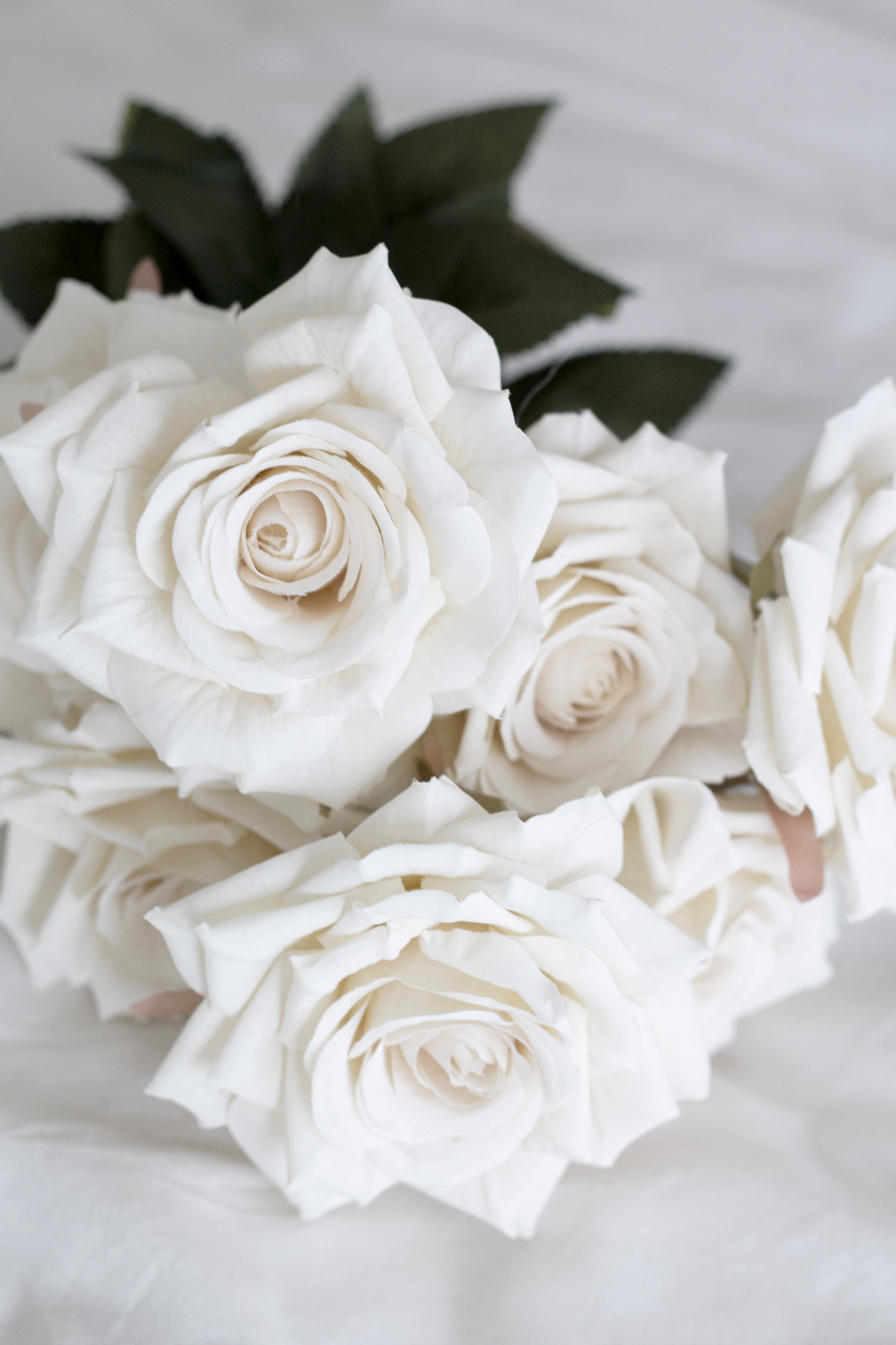 Close view of champagne faux rose heads