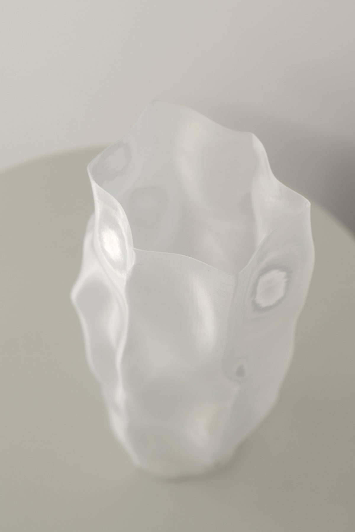 Overhead view into the open mouth of the ripple vase, showing the irregular rim