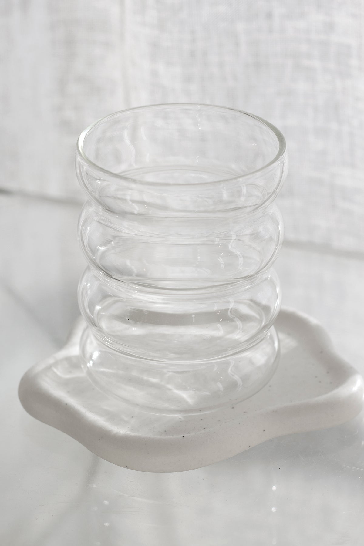 Caterpillar tumbler in clear rippled glass, 7.5cm diameter, sold individually