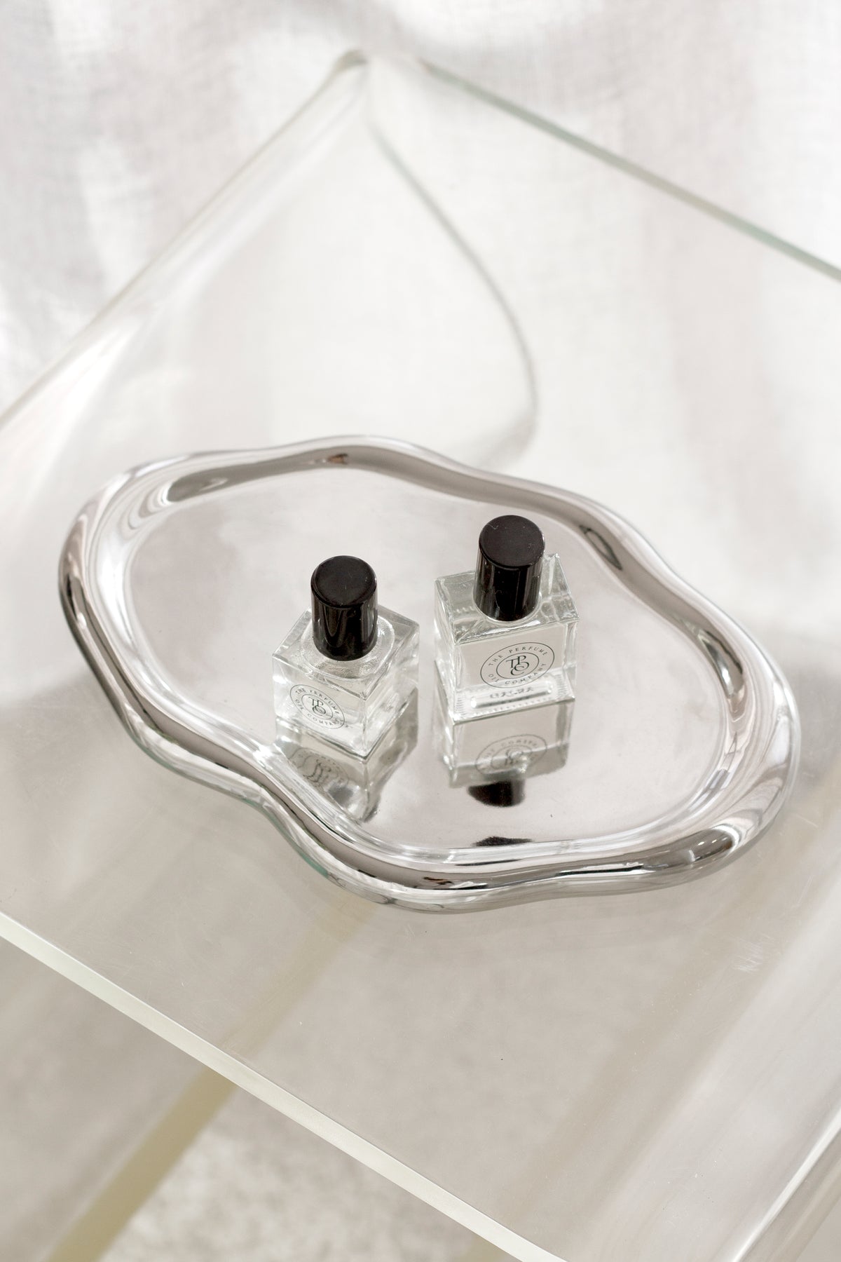 Small and large Silver Cloud Trays styled together