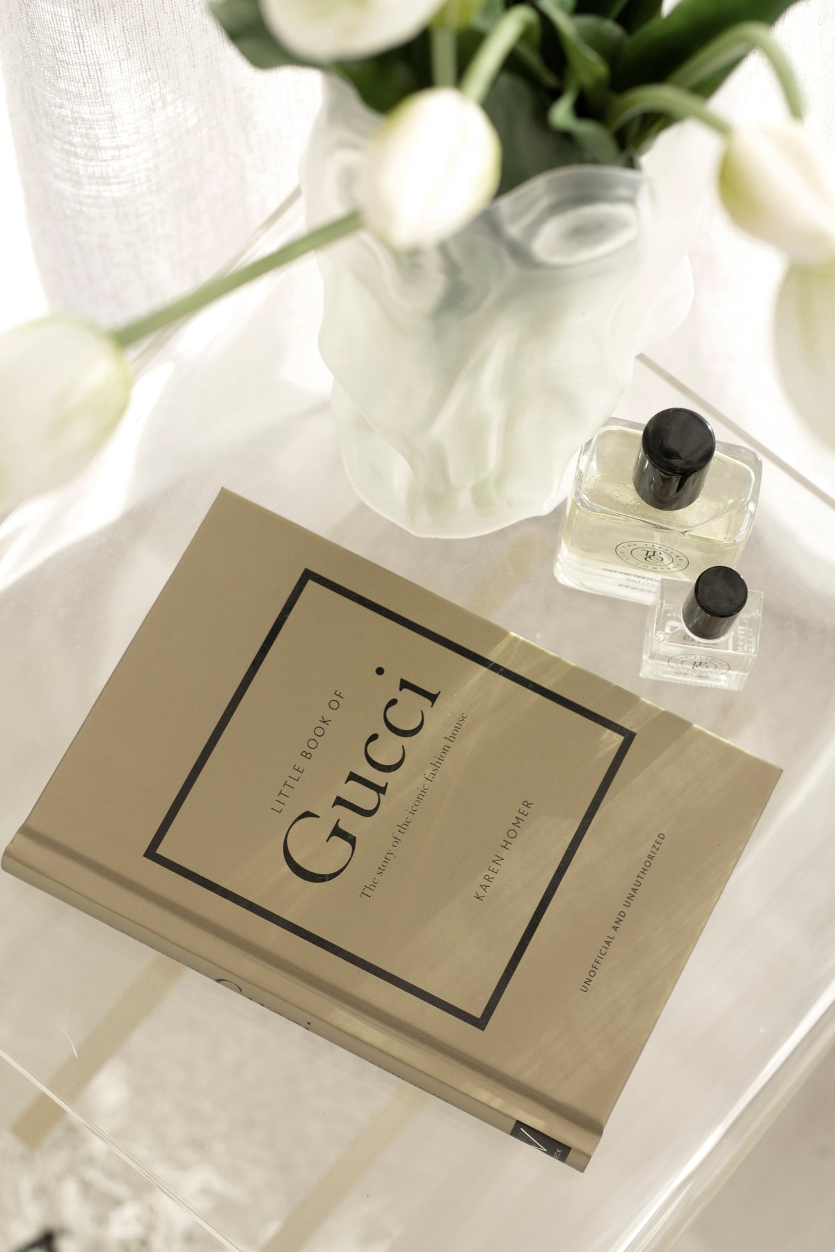 Little Book of Gucci stacked with other fashion titles