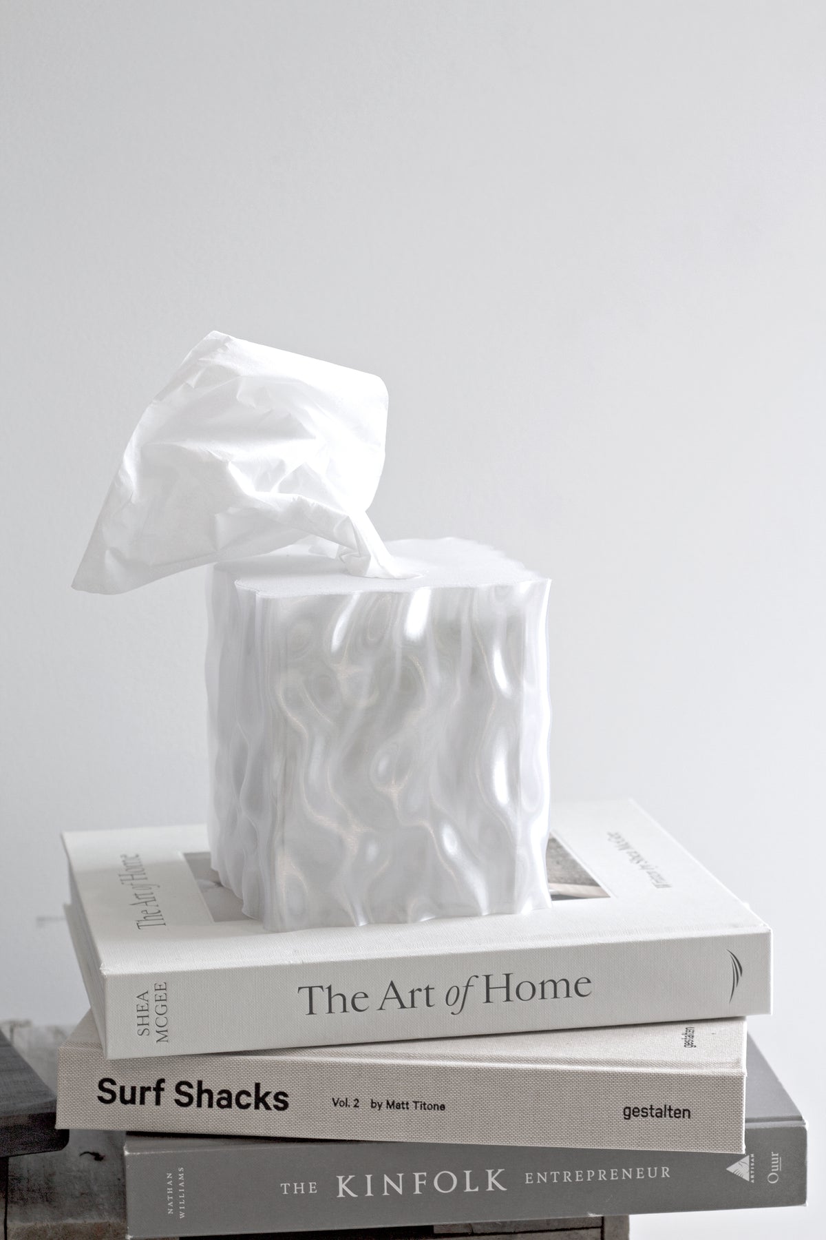 White Flow cover on stacked books seen from a lower angle