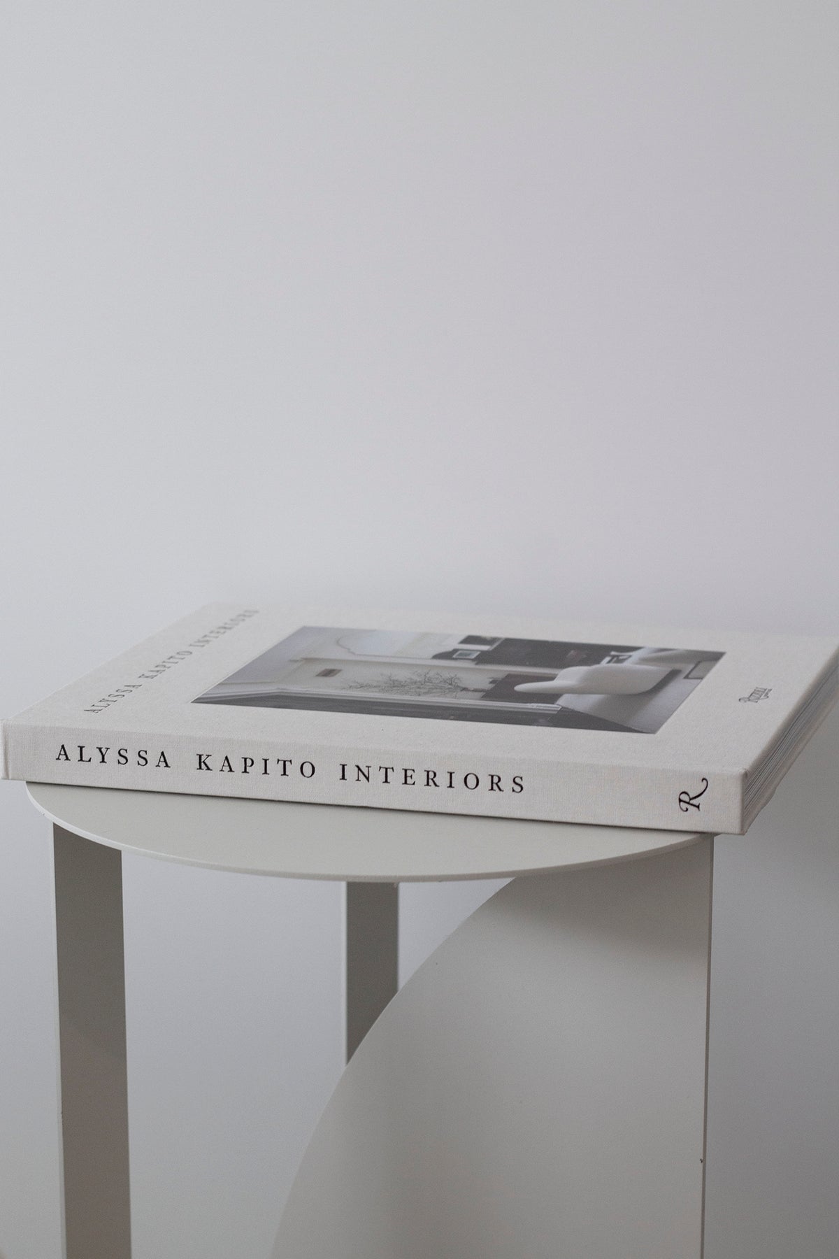 Alyssa Kapito Interiors page spread showing a living room