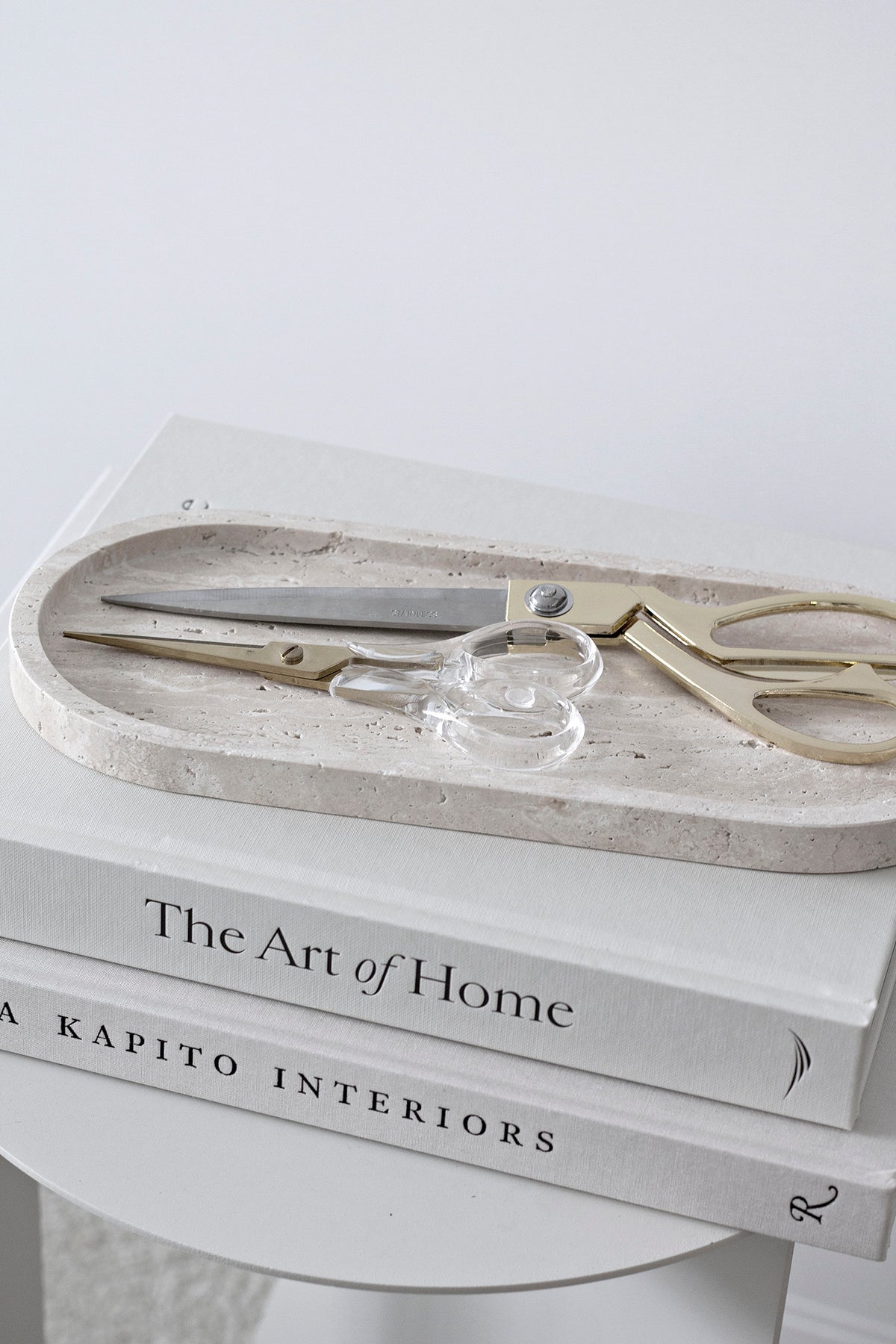 Line Tray styled on a console with candle and small vase