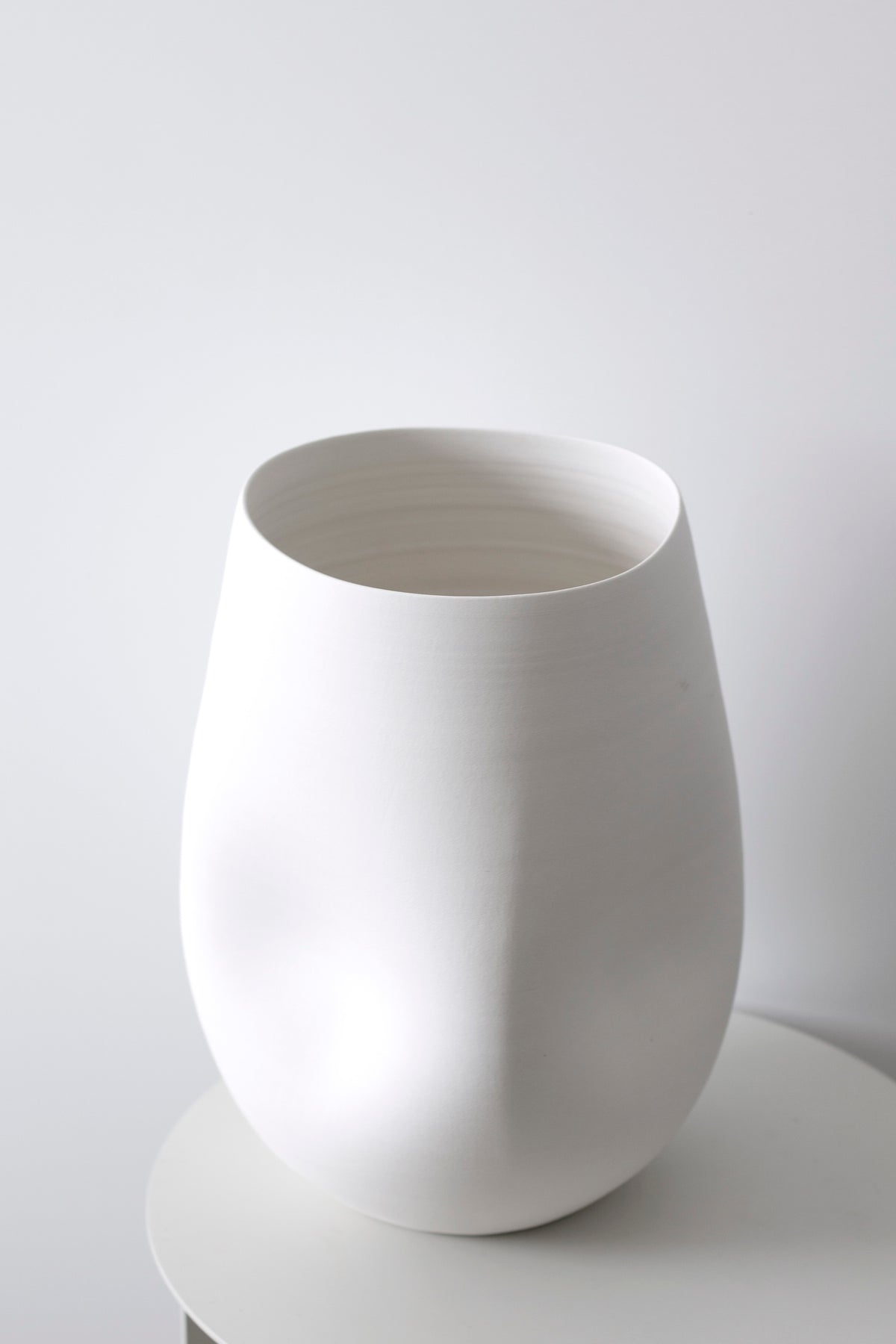 Node Vase grouped with smaller vessels