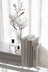 One Line a Day five year memory journal on a bedside table styled with a candle