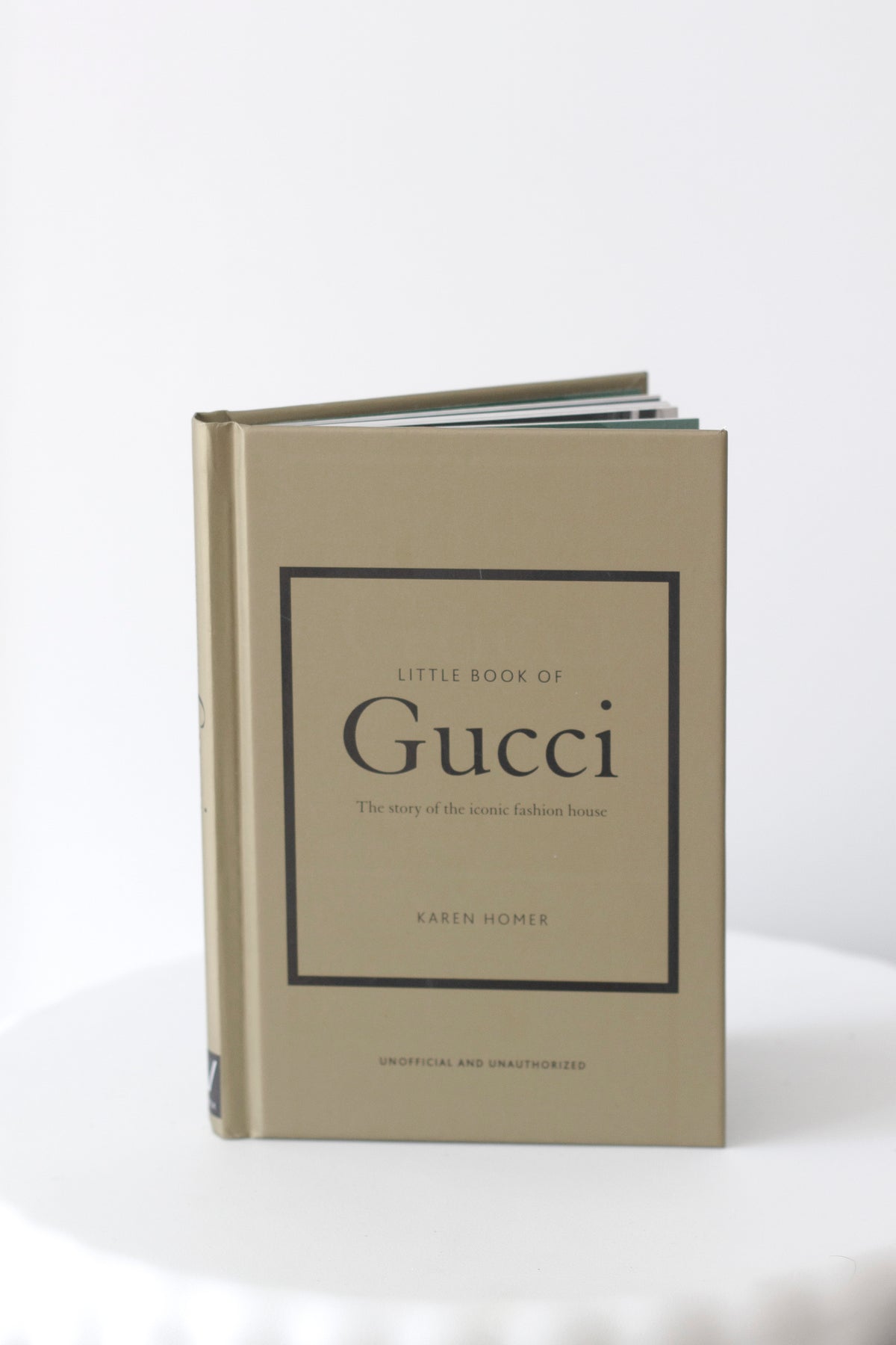 Little Book of Gucci cover detail on a neutral surface