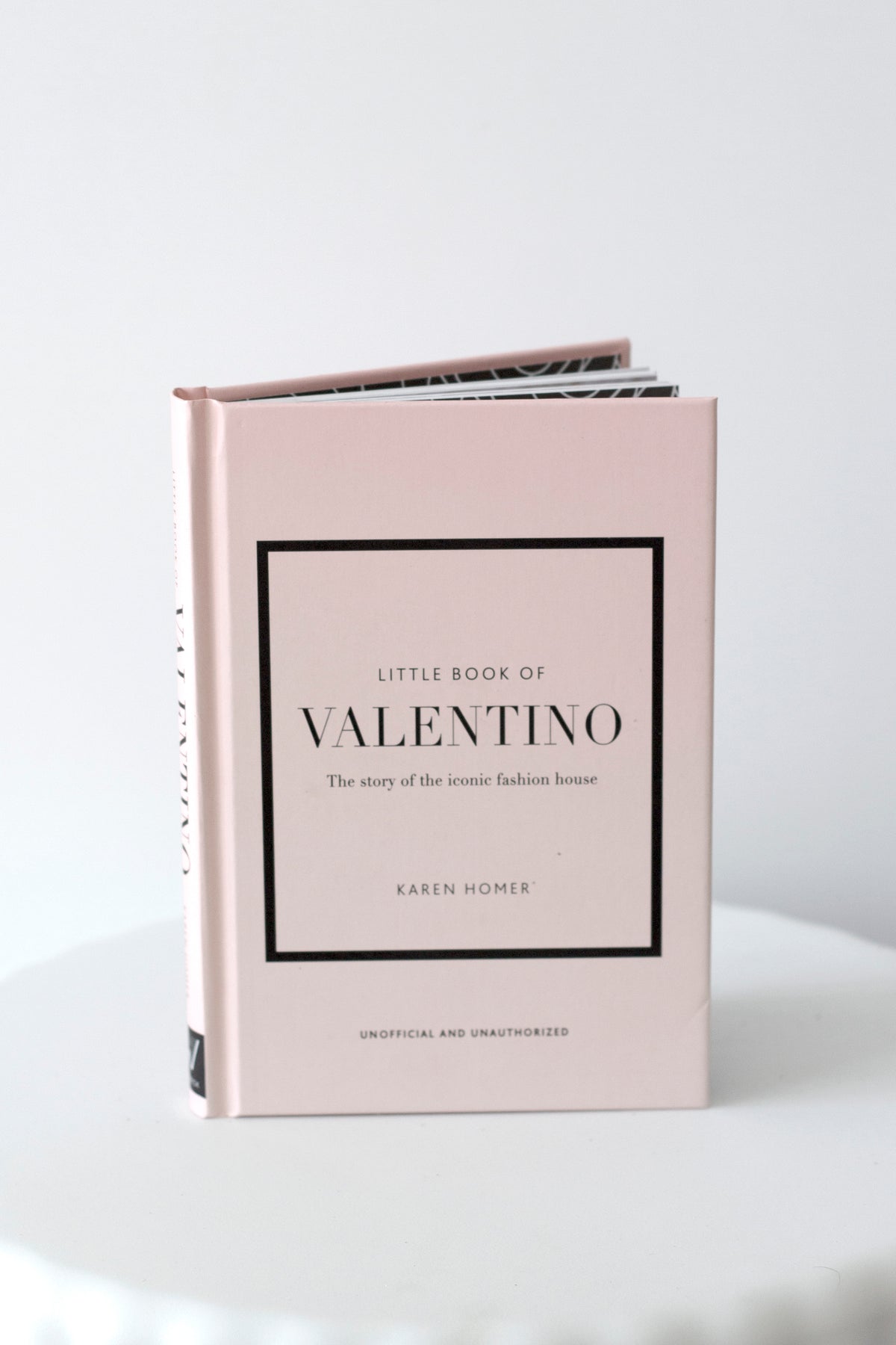 Little Book of Valentino styled on a coffee table