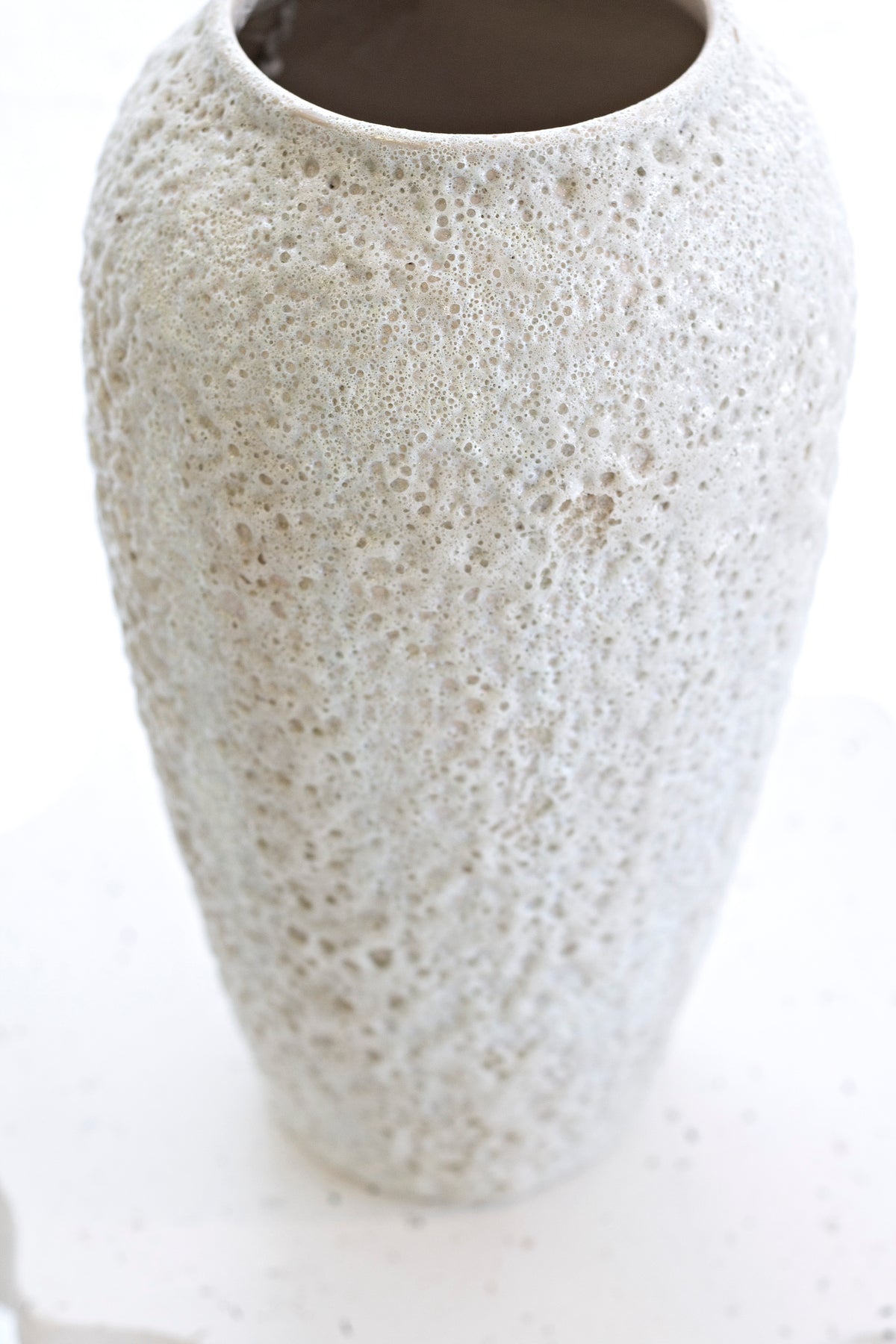 Close view of the tall Seafoam vase rim and upper body, showing the dark interior