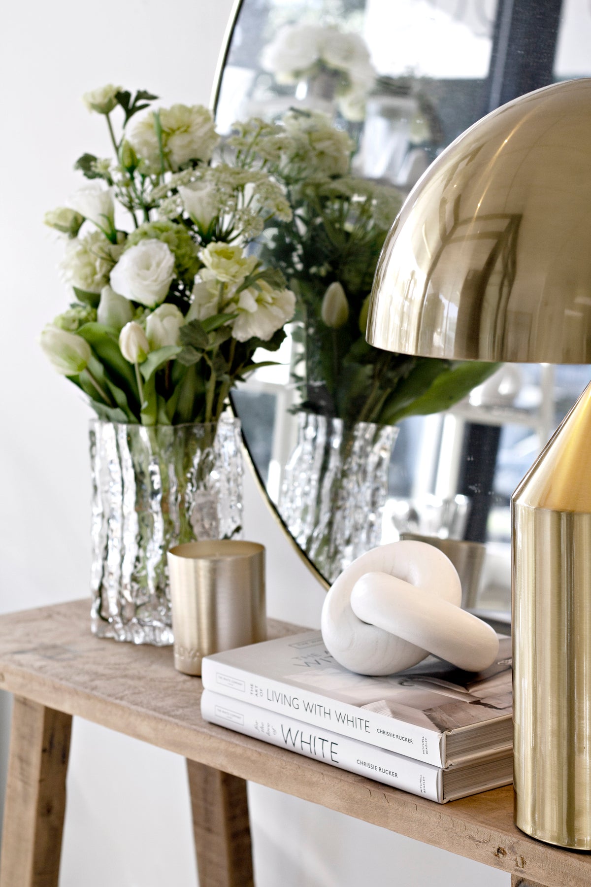 The Art of Living With White book styled on a shelf