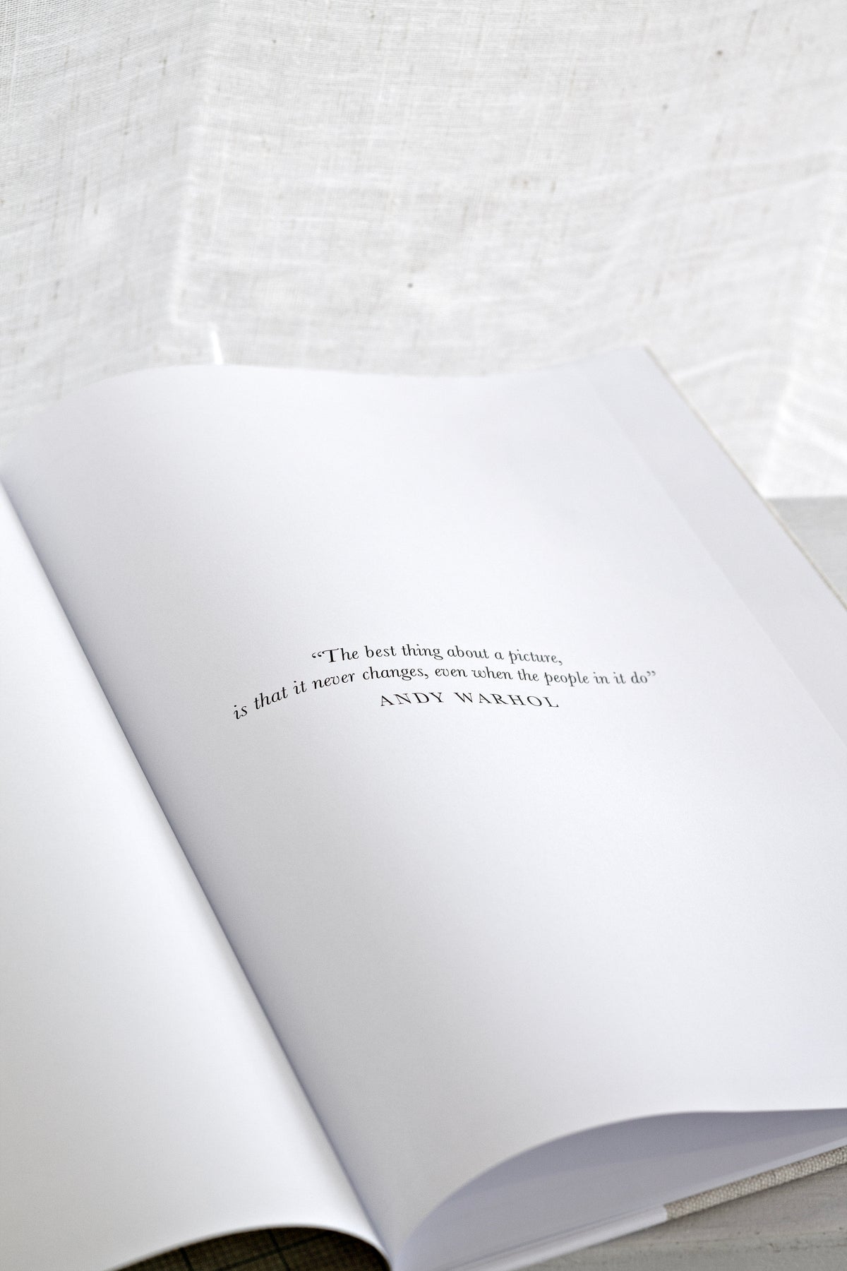 School Photos journal open at the dedication page with a short printed quote
