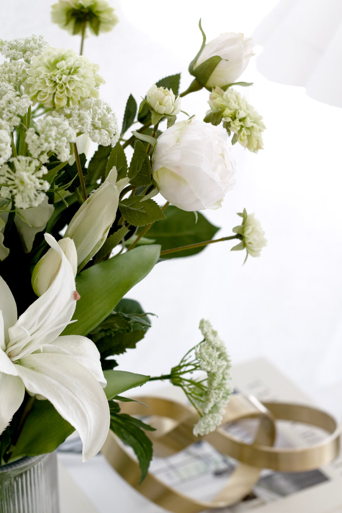 Dill ammi with white lilies and roses, close view