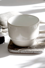 Stone Coasters – Natural Travertine & Dark Marble Set of 4 by Ned Collections