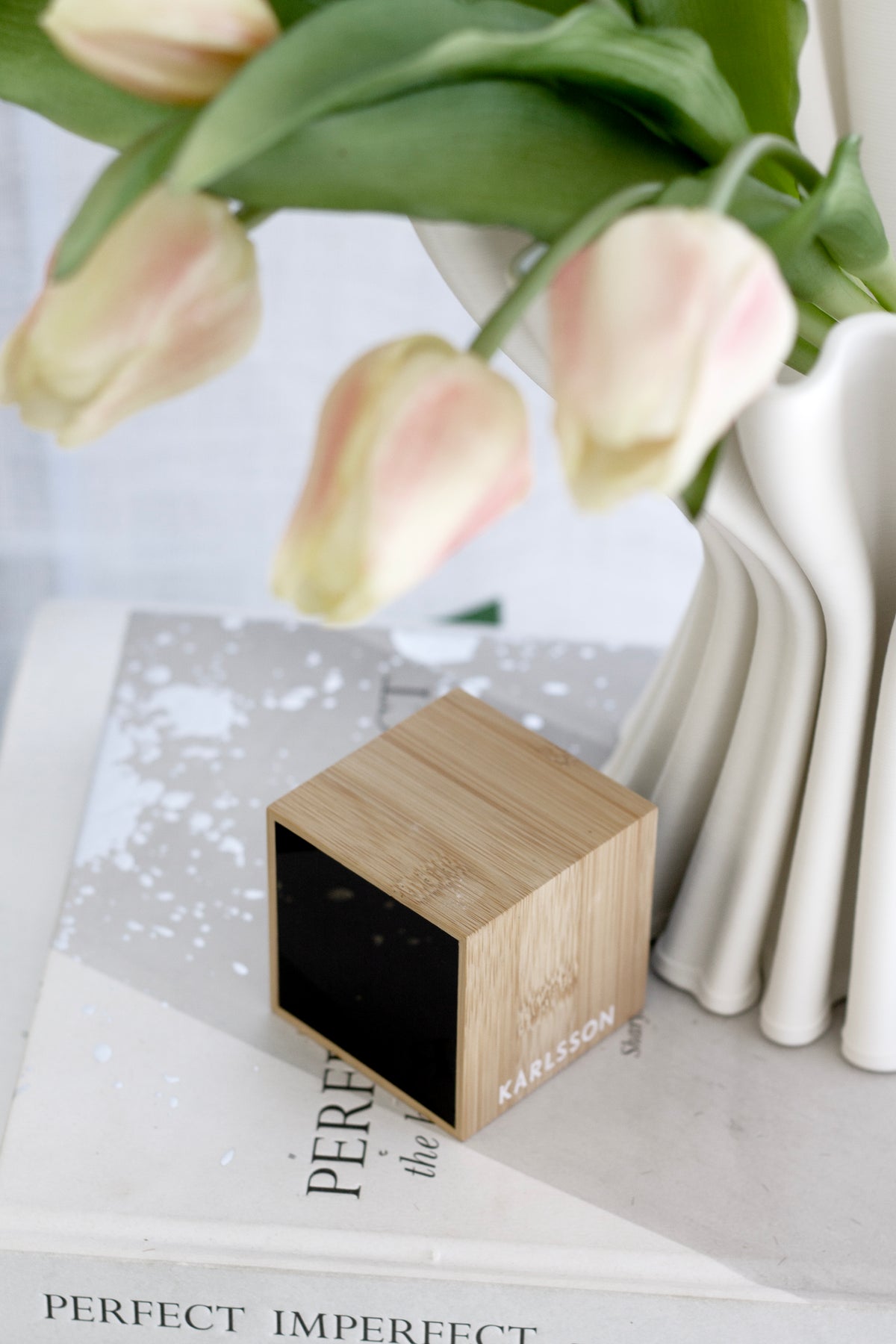 Karlsson Mini Cube LED Alarm Clock styled on a shelf