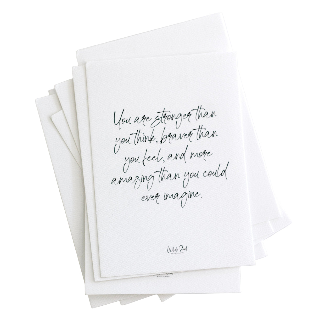Stack of Wilde Road affirmation cards on a white surface