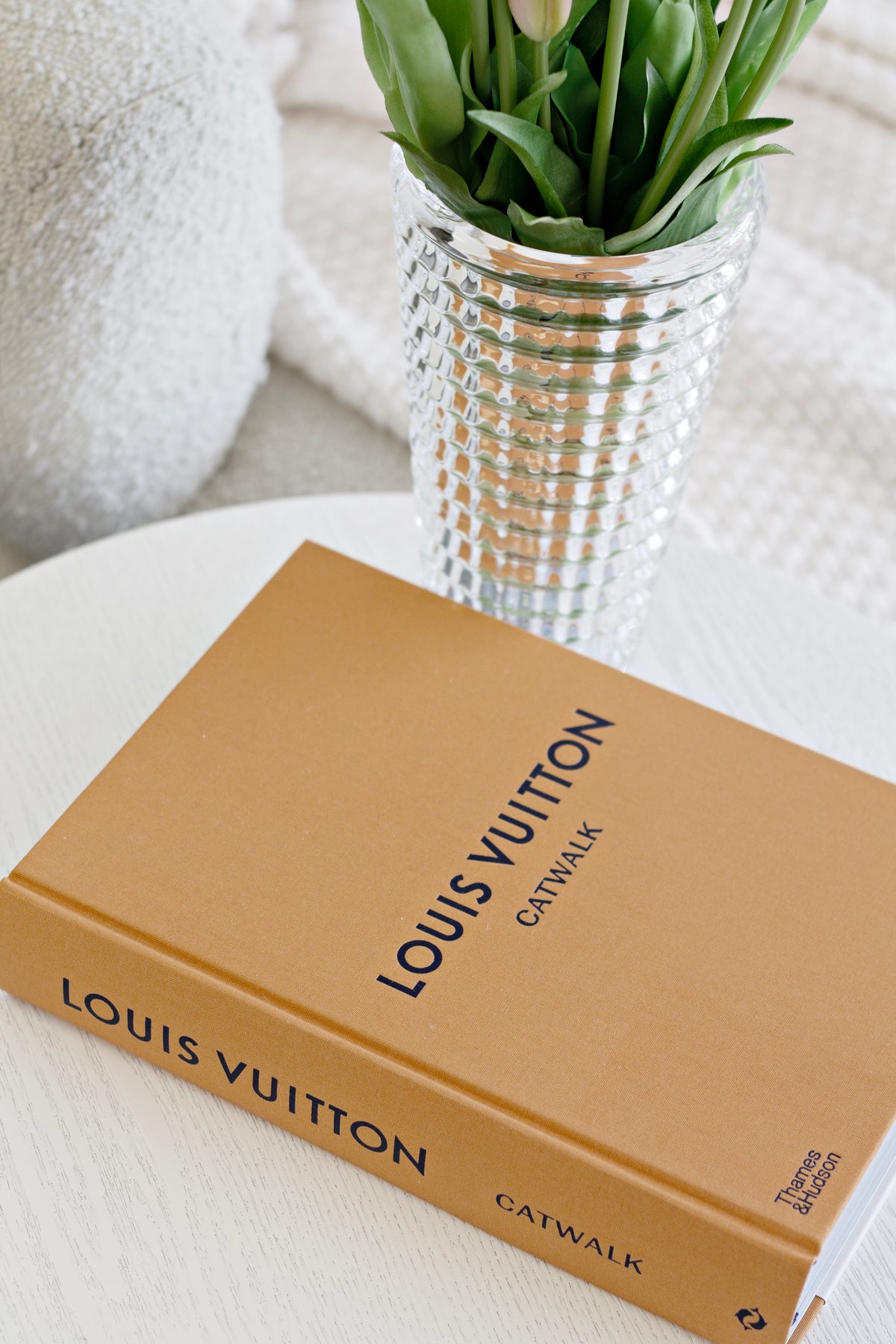 Catwalk fashion book series styled on a shelf
