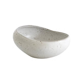 Speckled ceramic bowl on a white background