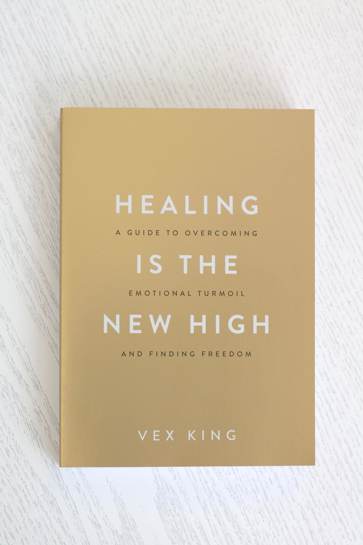 Healing Is the New High styled on a coffee table
