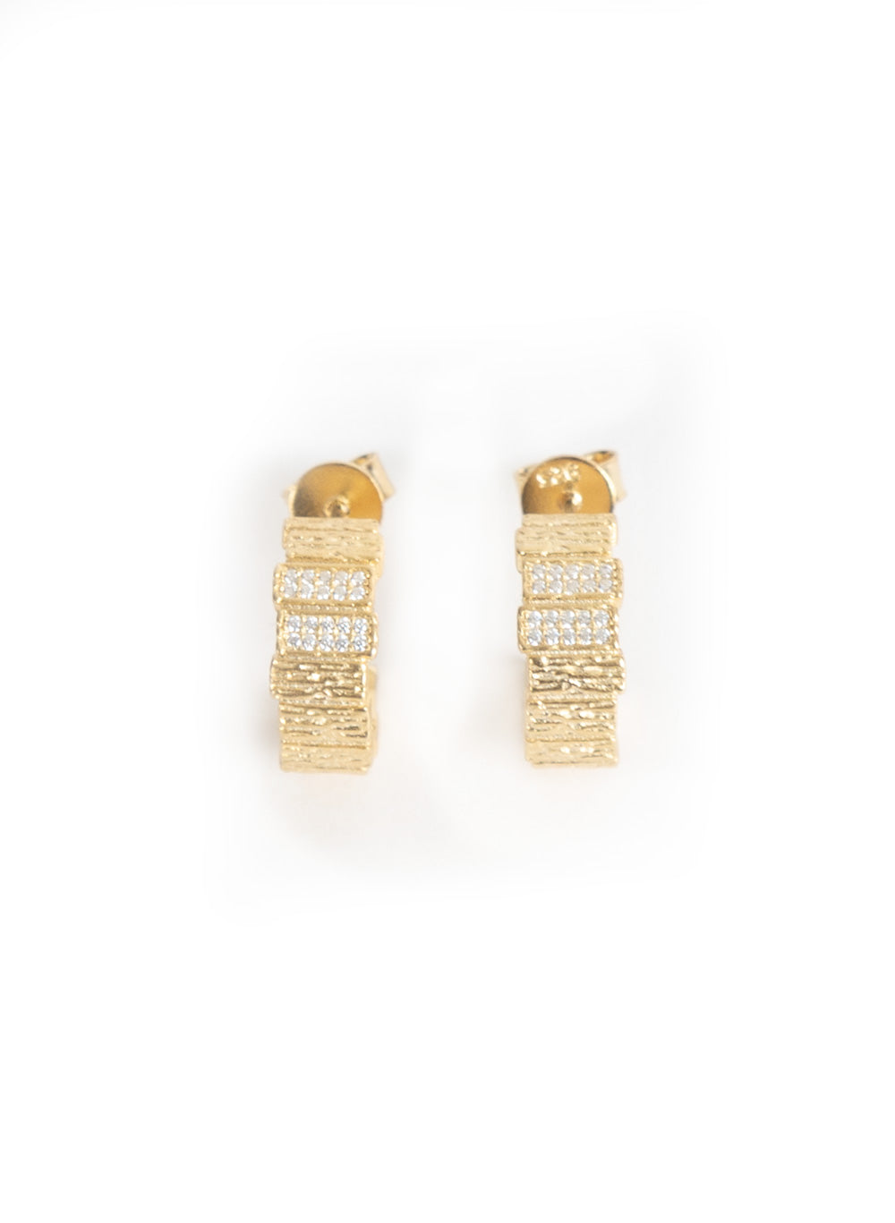 Impressions gold earrings, front view on white