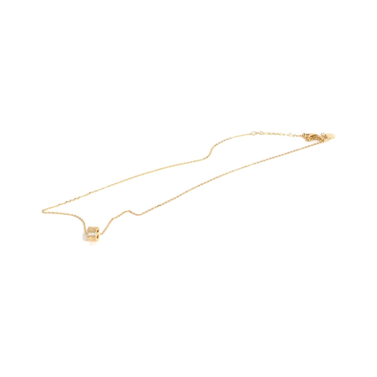 Impressions Necklace shown in the Gold option, fine gold chain with a small textured crystal charm