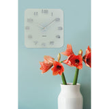 White Vintage Square wall clock styled on a wall